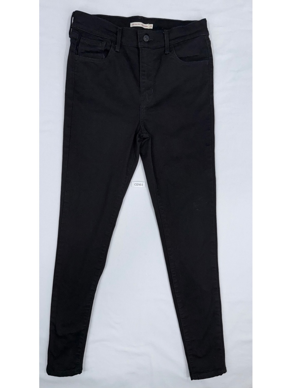 Levi's Black Skinny Jeans with Zip Fly, Size 29, Minor Wear on Leg